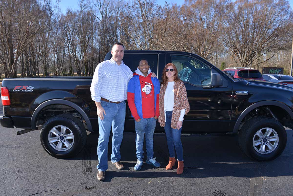 Laxavier with John and his wife