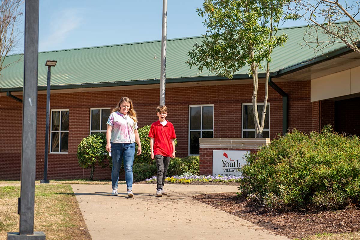 Karrisa walking with youth