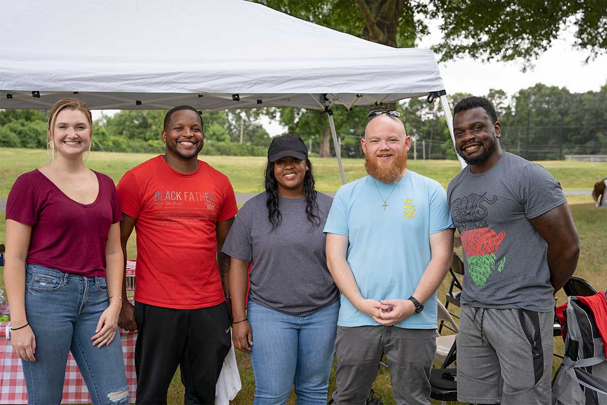 Diverse Youth Villages staff at campus event