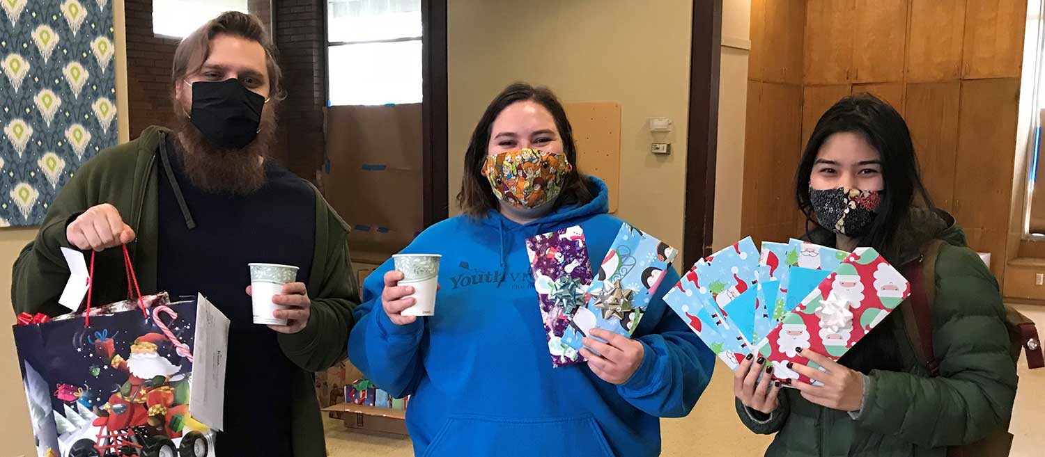 Oregon staff with Holiday Heroes gifts