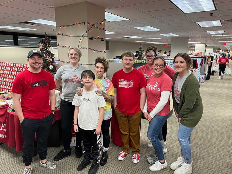 Journeys team at Holiday Heroes wrapping party