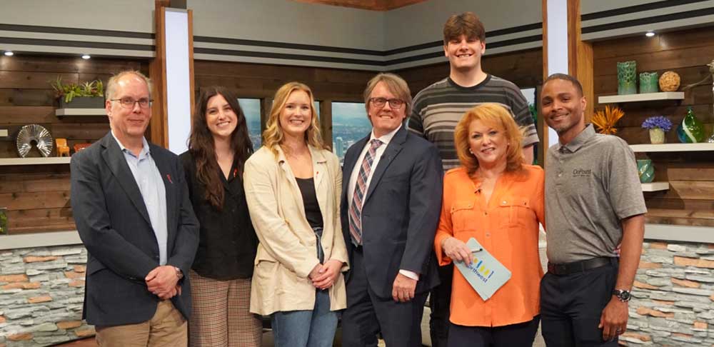 Andrew Grover with Youth Villages board members, KATU host and partners