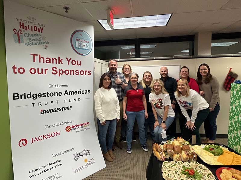 It’s a wrap! Bridgestone Americas and Jackson® team up with Youth Villages to wrap gifts for former foster youth as part of Holiday Heroes.