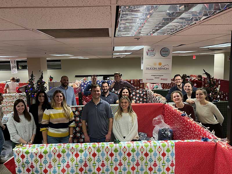 Silicon Ranch Holiday Heroes wrapping party