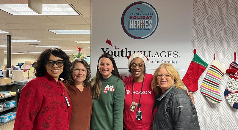 corporate volunteers from Jackson help with Holiday Heroes