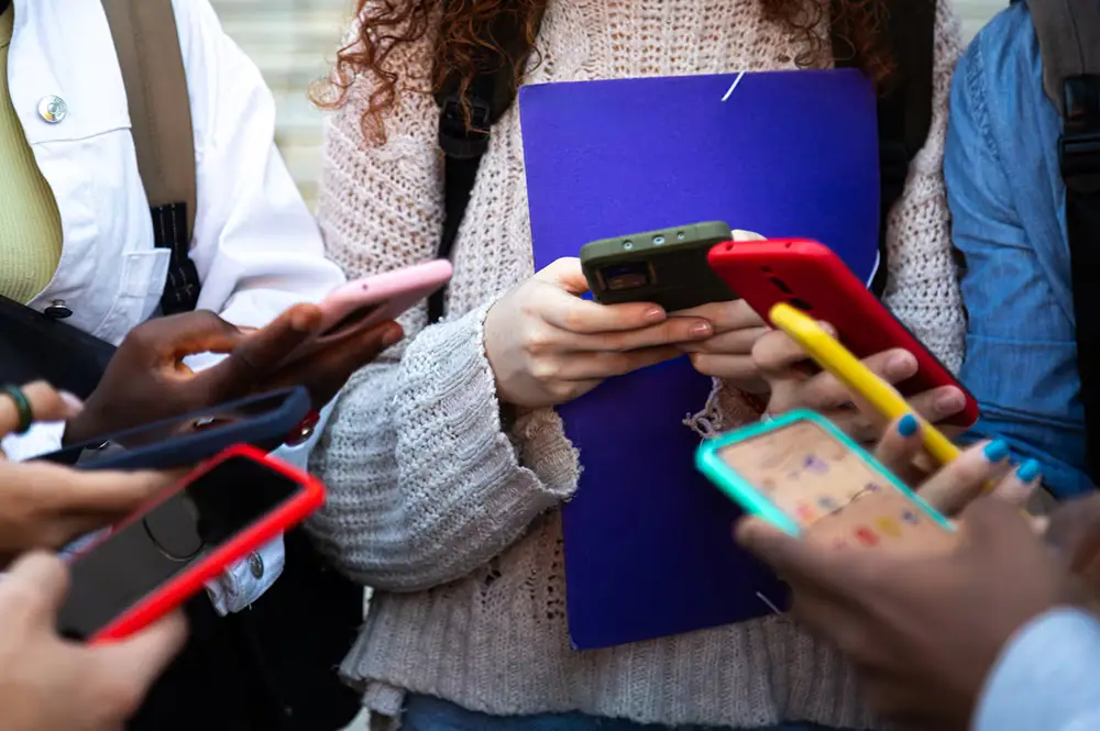 Teens on cell phone