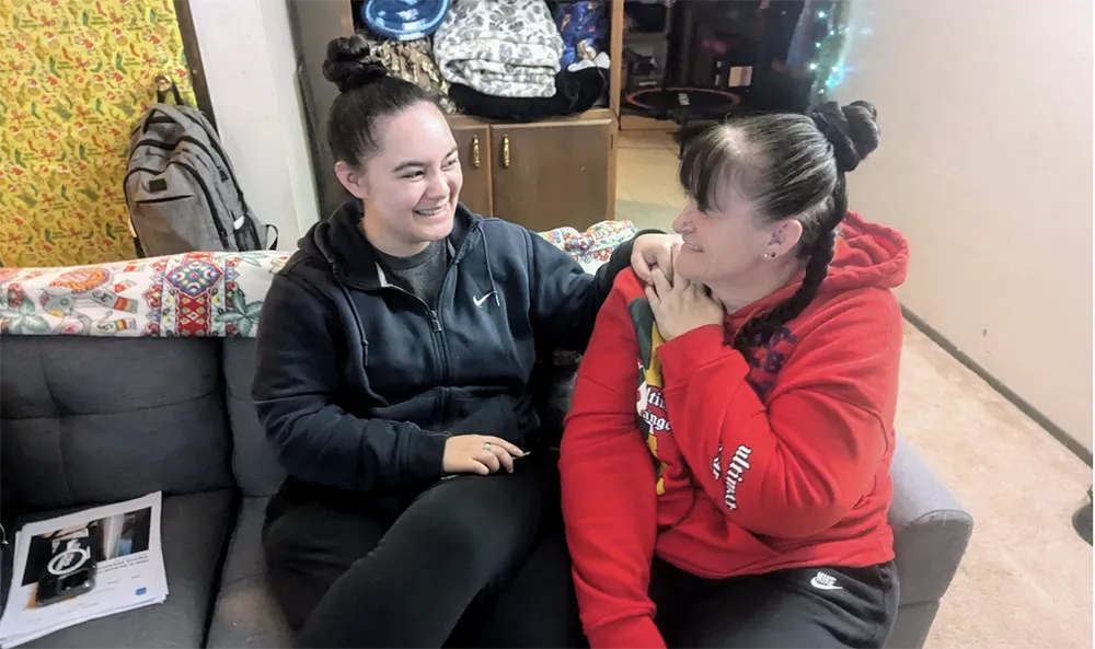 Mom and daughter in Intercept program laugh and smile